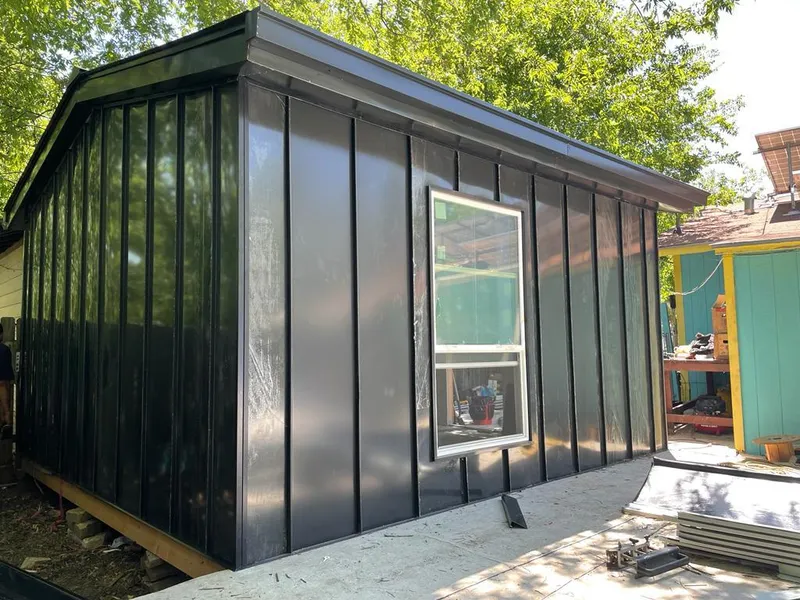 Black standing seam metal wall panels for Metal Roof Installation in Eliot