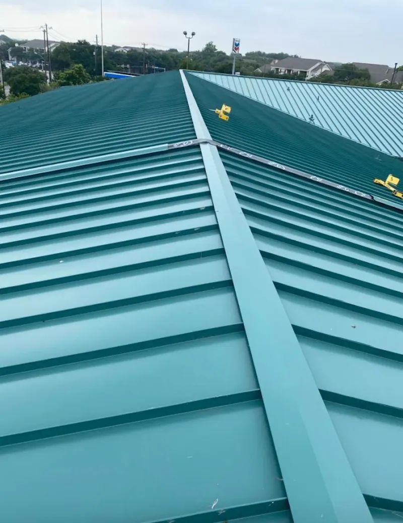 Green commercial metal roof ridge and valley for Metal Roof Repair in Eliot